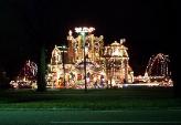 lights on a christmas house with music